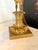 A striking matched pair of American gilt brass five-light figural candelabra by H.N. Hooper & Co. of Boston, dating to...