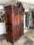 Vintage Mahogany Armoire / Wardrobe with Decorative Floral removable cornice. Solid Wood armoire is a vintage freestanding...