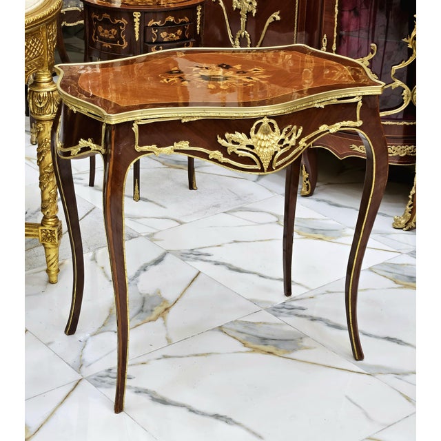 Bring timeless French elegance into your home with this exquisite Louis XV side table. Expertly handcrafted from fine...