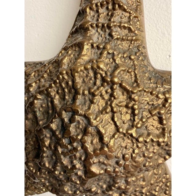 Vintage large brass starfish sculpture. Able to be hung on the wall or set atop books on your coffee table. Great vintage...
