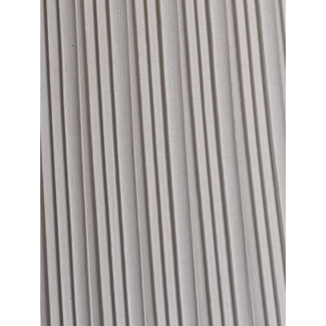 this is a well made linen shAde , the top of the shade is 10" wide getting larger to the bottom at 16" and the length is 16"