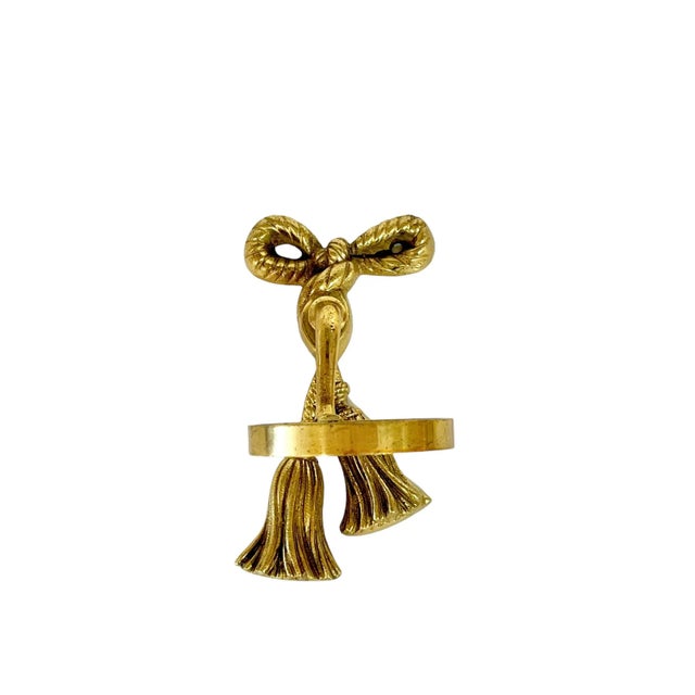 Charming vintage brass bow and tassel bathroom cup holder. Sourced in France. Screw holes in the center of the ribbon....