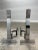 Pair of Mid-Century fireplace andirons in chrome by Alessandro Albrizzi