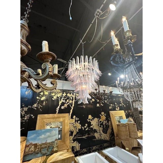Gorgeous modern Murano "saddle" glass chandelier in soft pink. The chandelier has been professionally rewired, comes with...