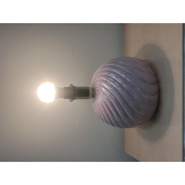 24cm diameter × 30cm high (base only). A beautiful 1970s ceramic table lamp in a softly iridescent pink glaze, featuring...