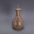 This striking ceramic ewer is a beautiful example of traditional Chinese-inspired pottery, characterized by its...