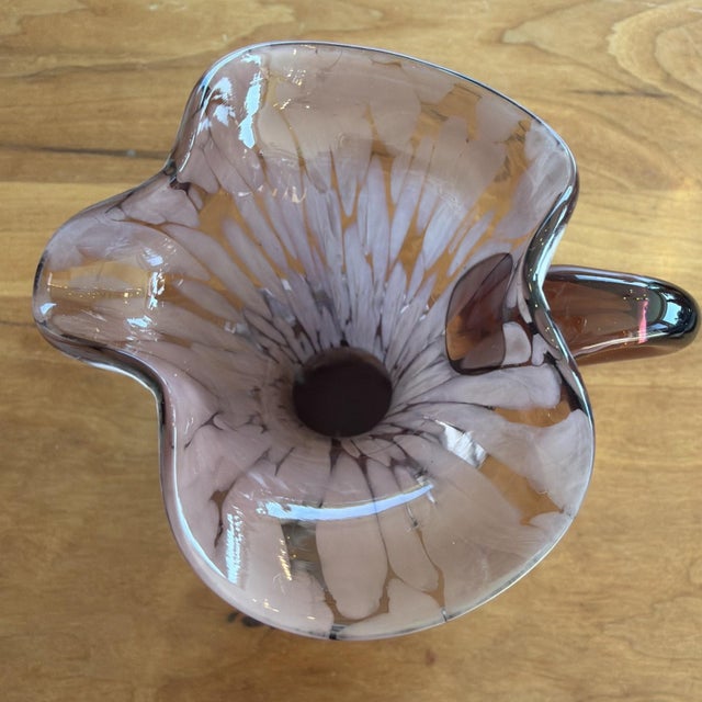 Beautiful vintage hand-blown art glass mini pitcher / creamer featuring rich amethyst-purple glass with milky white...