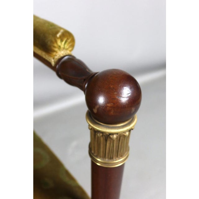 Sofa and two chairs Empire in mahogany and ornamentation of golden bronzes. This set is covered with velvet to laurel...