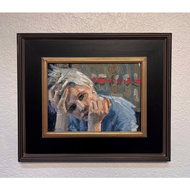 Remembered Nights captures a moment of introspection, depicting a figure resting their chin on their hand with a...