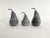 Medium size solid gray marble pear with metal stem. Slight variations in color and dimensions. Available in two sizes.