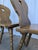 Set of 8 vintage wooden dining chairs in Tyrolean style. The chairs feature solid wooden construction with bobbin-turned...