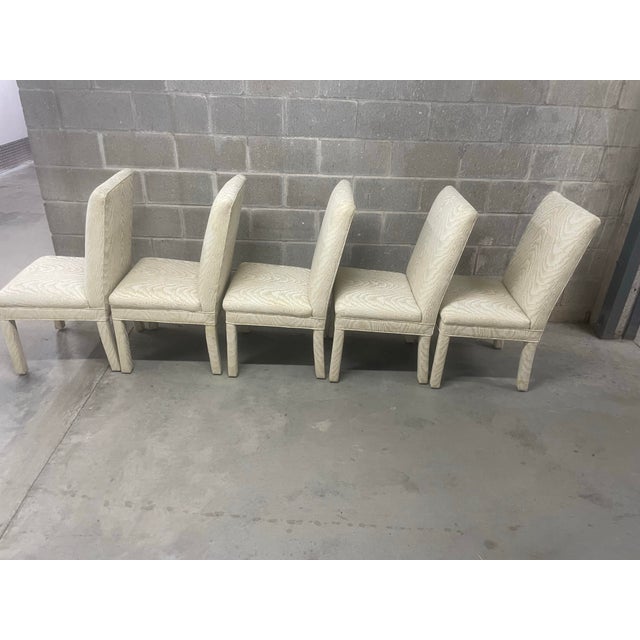 Mid Century Modern Parson Dining Chairs. Set of 6 upholstered in a muted two tone Faux Bois pattern. 1 arm chair 5 chairs.