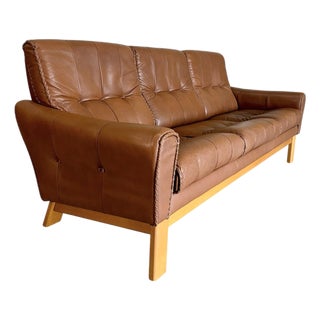 Mid Century Caramel Leather and Beech Sofa With Baseball Glove Stitching For Sale