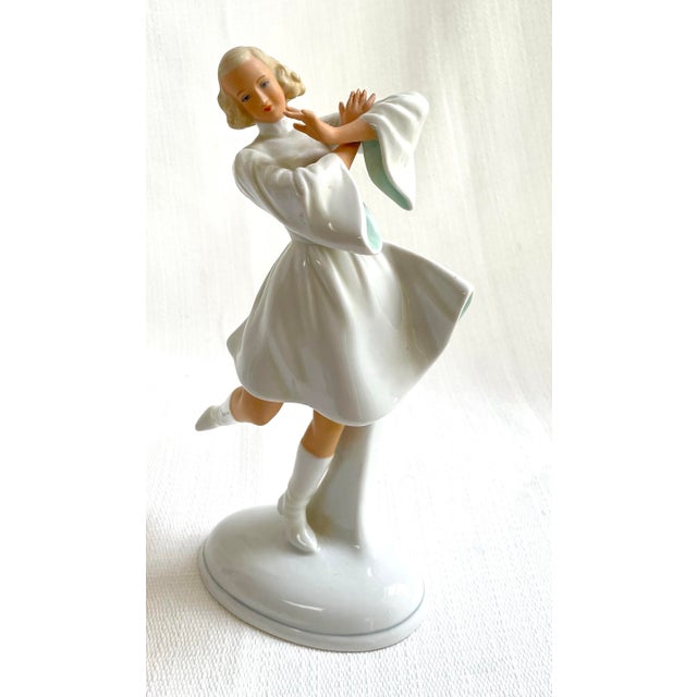 There is a beautiful fluidness to this porcelain dancer in motion. Made in Germany by Schaubach Kunst who are known for...