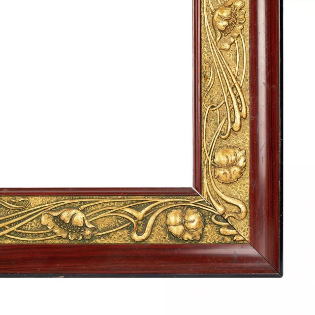 Brown, Art Nouveau wood frame, with a gilded plaster band with a lively sprouting ornament. External dimensions: 64x73 cm....