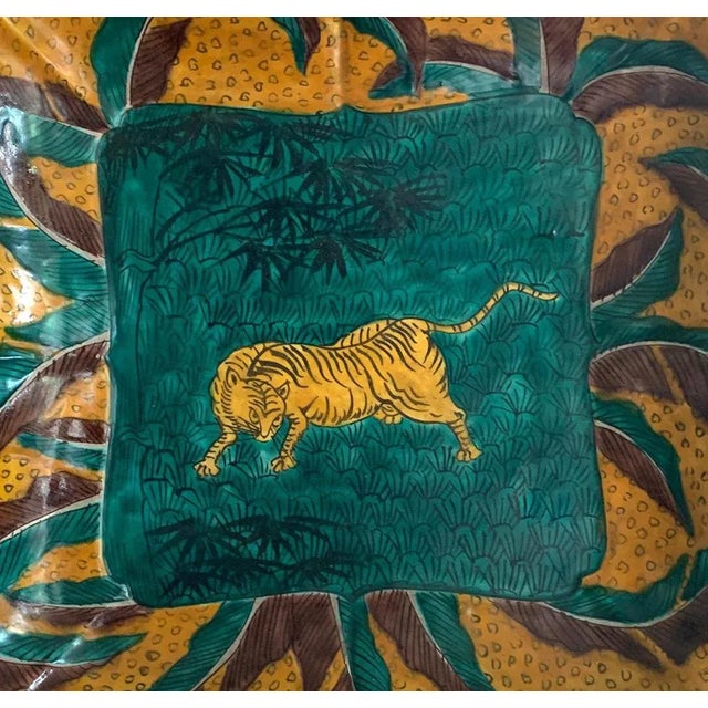 A Japanese stoneware dish with overglaze decoration in the shape of barbed quatrefoil shape from late Edo period, circa...