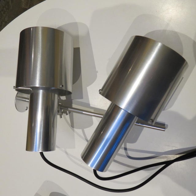 Rare aluminium ceiling light designed by Peter Nelson and produced by Architectural Lighting Ltd. Dates from the early...