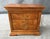 This Thomasville two-drawer nightstand features a beautifully figured burled walnut veneer, highlighted by rich tones and...