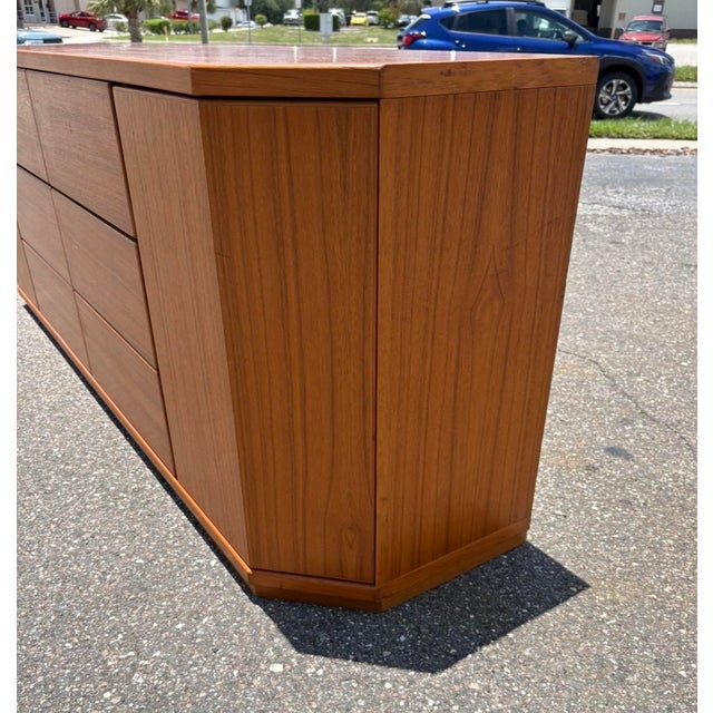 This teak sideboard is a great piece for a number of places - entryway, living room, or even as a bedroom dresser....