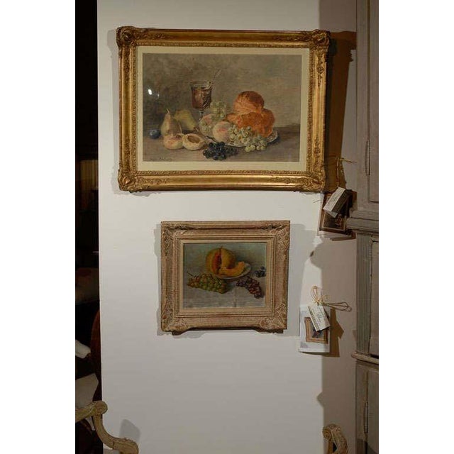 19th century framed oil still life painting of fruit, grapes, and melon.