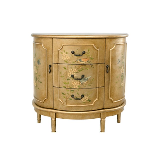 Charming half-round accent cabinet in an antiqued gold finish, hand-painted with songbirds perched on flowering branches....