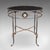 This is a vintage oval garden table. A French, cast iron and steel veranda serving table in Regency revival taste, dating...