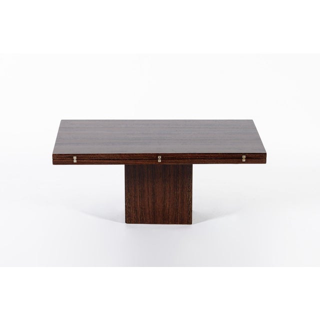 This exceptional and rare antique French Art Deco foldable elevated coffee table attributed to Francisque Chaleyssin is...