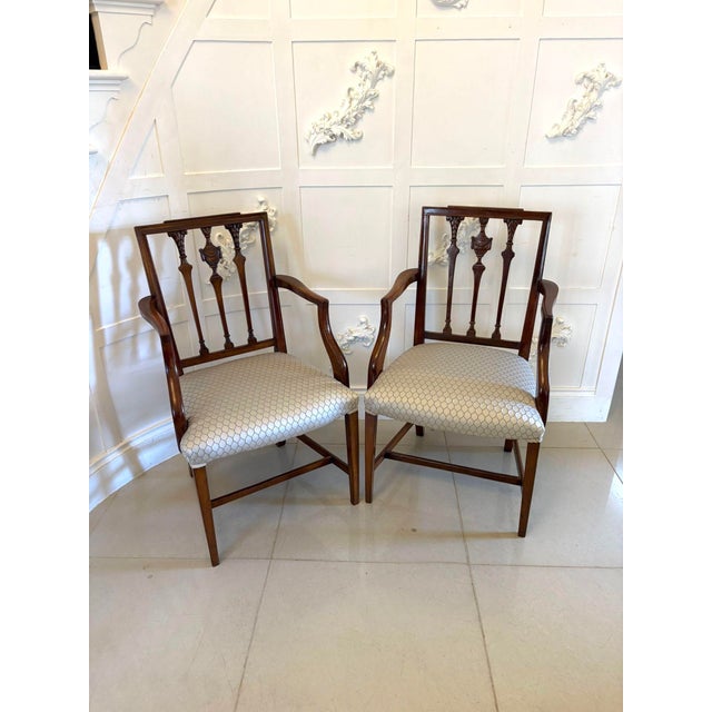A very elegant set of eight antique Victorian mahogany dining chairs comprising six side chairs and a pair of carvers....