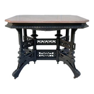 Antique Eastlake Pink Marble and Griffin Carved Rolling Table For Sale