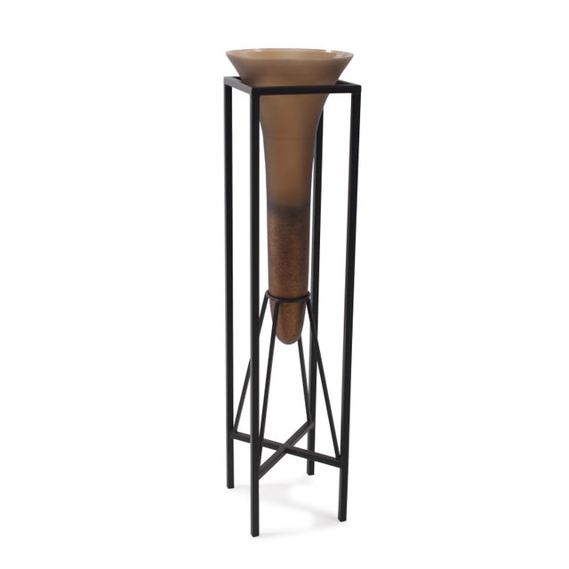Expertly inset into a sleek flat black iron stand that seamlessly marries form and function. The bronze glass finish...