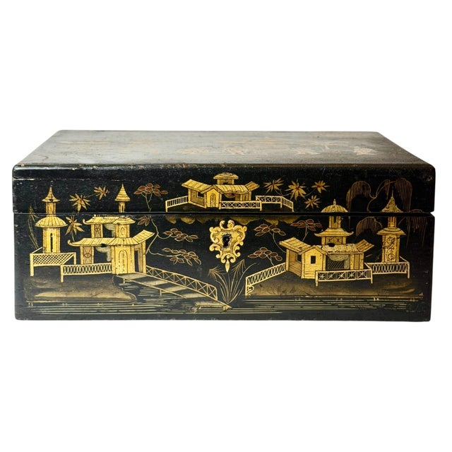 A beautifully crafted Chinese Chinoiserie box, featuring high-relief decoration and a generous size. The whimsical...