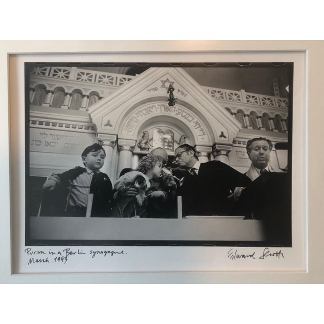 Edward Serotta Purim in the Pestalozzi Strasse Synagogue Berlin. silver gelatin print, matted, captioned by hand and hand...