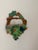 A charming vintage majolica-style wall pocket, hand-molded and glazed to resemble a woven basket overflowing with grape...