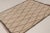 Handknotted in wool and originating from Morocco circa 1950-1960, this 5x6 vintage Moroccan tribal rug is an exciting new...