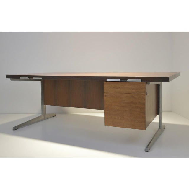 This impressive executive desk by nipu presents itself in very high quality and straightforward. The beautifully grained...
