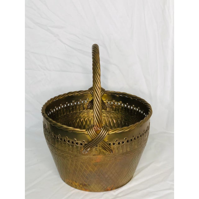 Nice heavy, hand made brass planter or basket. Heavily embellished with quilted pattern bottom with row of flowers, topped...