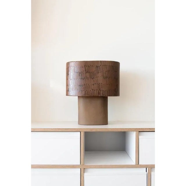 Red stoneware table lamp by lucas huillet dimensions: d 38 x w 35 x h 38 cm materials: red stoneware and hand painted...