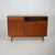An Italian sideboard from the 1960s characterised by an articulated and functional composition, combining closed storage,...
