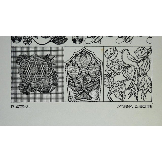 Circa 1920's textile embellishment designs by Minna D. Behr. Plate 19, black on gray heavy stock paper. Corner bumps.