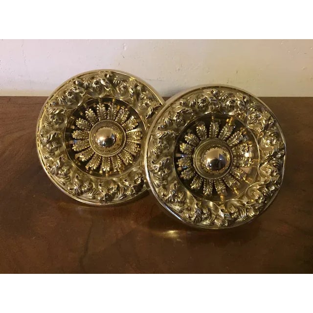 Set of two very large antique 19th c. curtain tie backs - measuring 6 1/4" in diameter x 4" deep with wall attachment....