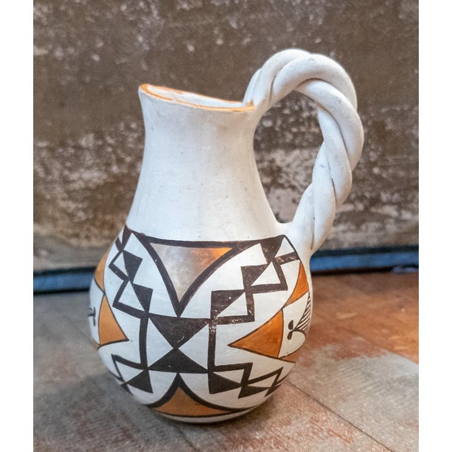 We are selling this nice decorative Mid-Century polychrome Acoma Native American Indian vase. This vase has nice geometric...