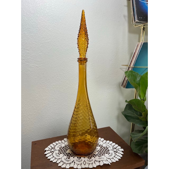 Vintage Mid Century Amber Glass Optic Empoli Genie Decanter 22” Tall In good condition no chips or cracks. Made in Italy!...