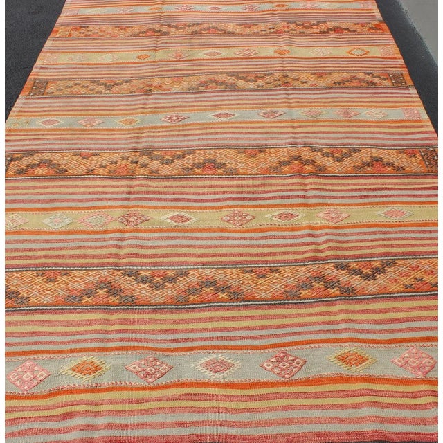 Turkish Kilim Vintage Rug With Assorted Stripe Design in a Variety of Colors For Sale - Image 9 of 13