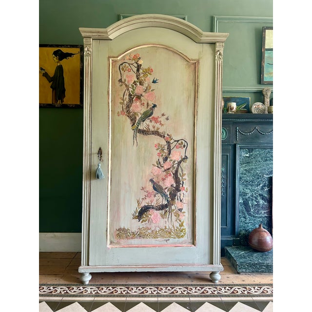 Beautiful antique painted armoire, we have addded a stunning chinoiserie panel with an aged patina. The cupboard currently...