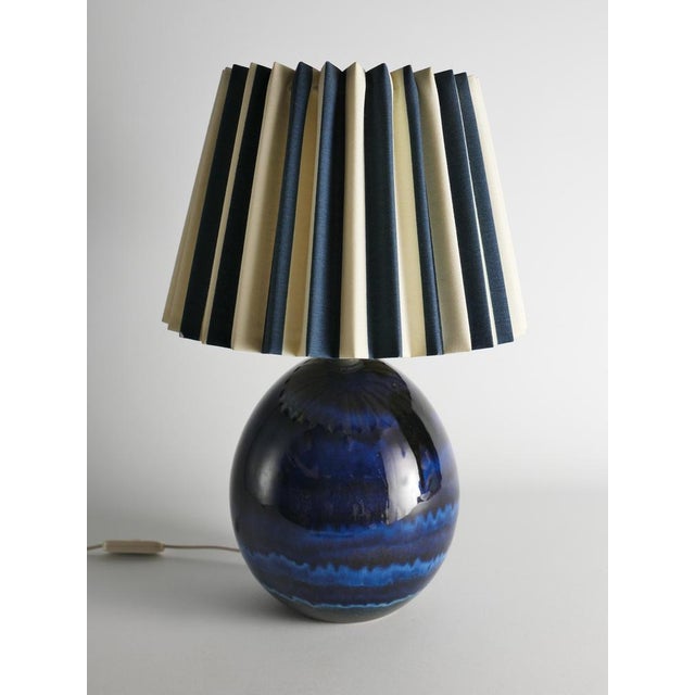 A beautiful mid-century modern stoneware table lamp by renowned swedish ceramicist carl-harry stålhane, produced for...