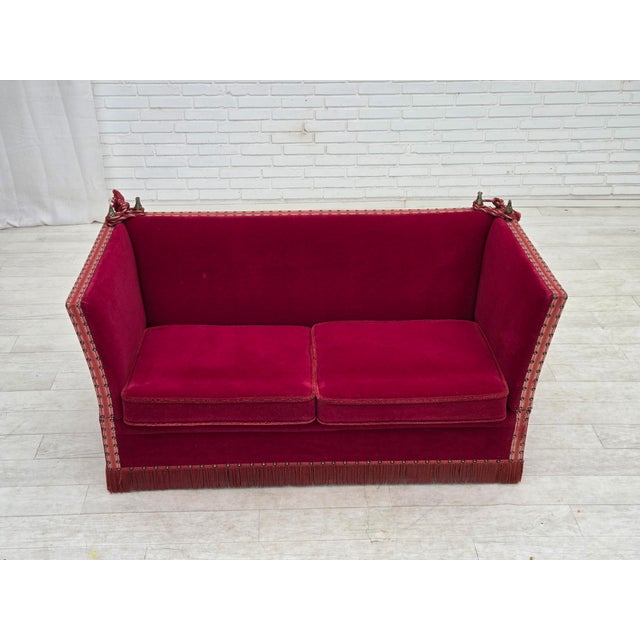 1970s, Danish 2-seater drop arm "Spanish" sofa. Original red furniture velour, ash wood legs, springs in the seat...