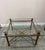 Fabulous faux bamboo wood with glass top and antiqued brass finials coffee table . Circa 1970’s Measures 36” x 48” x 17” h...