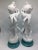 Outstanding pair of Italian cherubs on pedestals. These gorgeous decorative pieces are collection worthy! Solid white on...