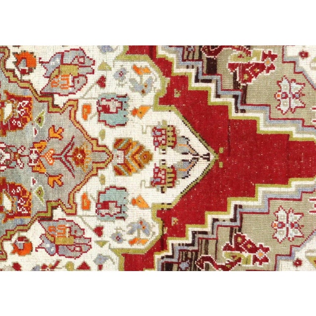 1960s Turkish Oushak Rug. Hand woven with wool on wool foundation in the Oushak region of Western Turkey. The Anatolian...