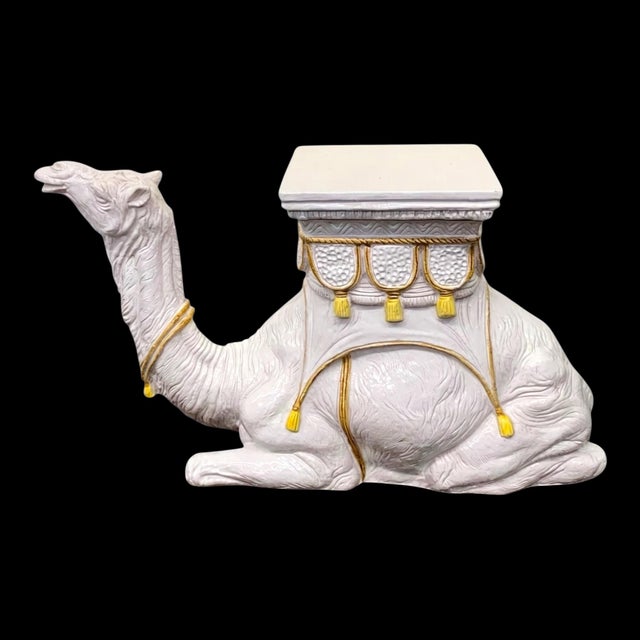 This is a large scale Hollywood Regency Italian white terracotta camel form side table or garden seat. His seat has bright...
